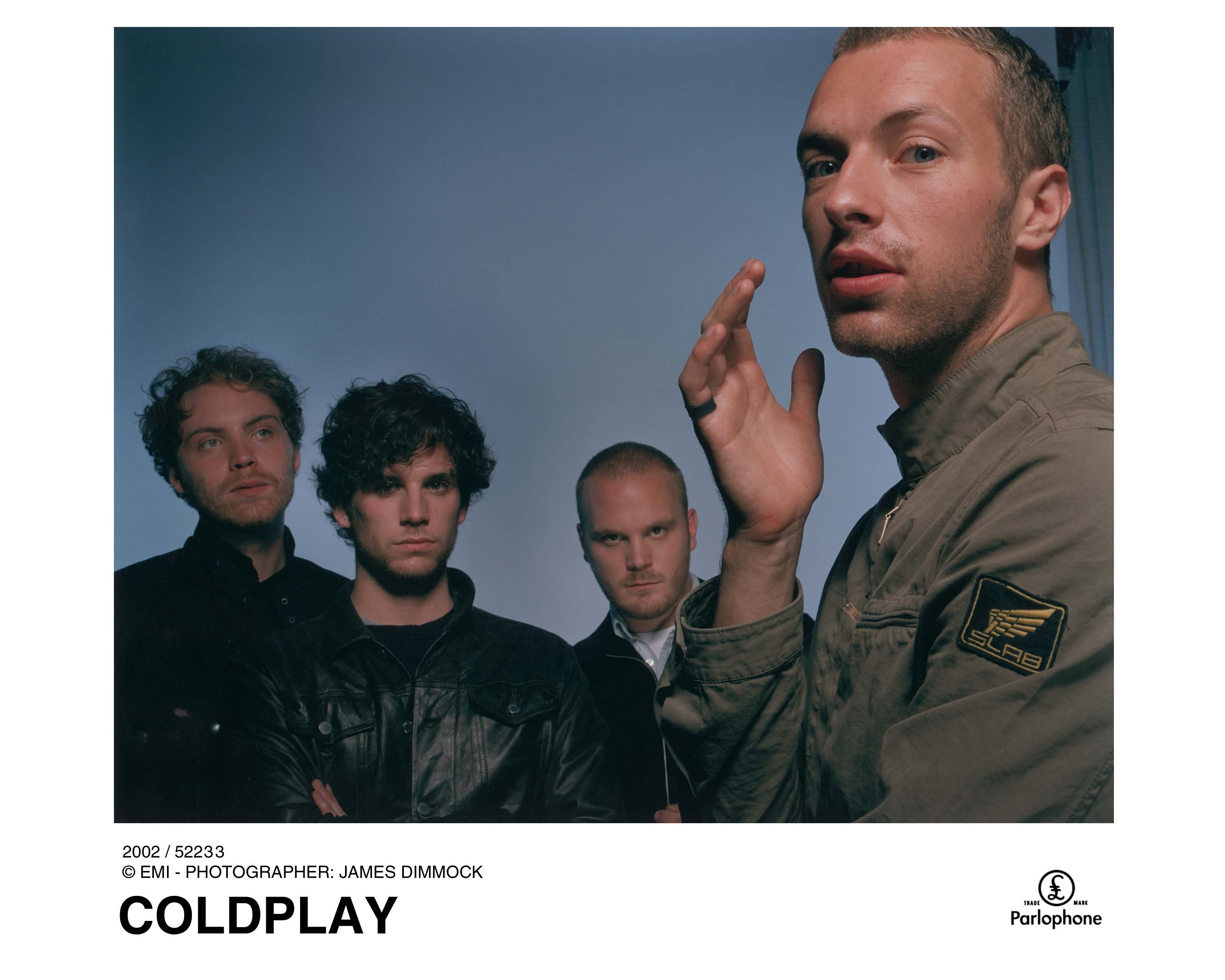 COLDPLAY: Guitarist Jon Buckland, bassist Guy Berryman, drummer Will Champion, singer/keyboards/guitarist Chris Martin. [Photo by JAMES DIMMOCK used by permission of Capitol Records.]